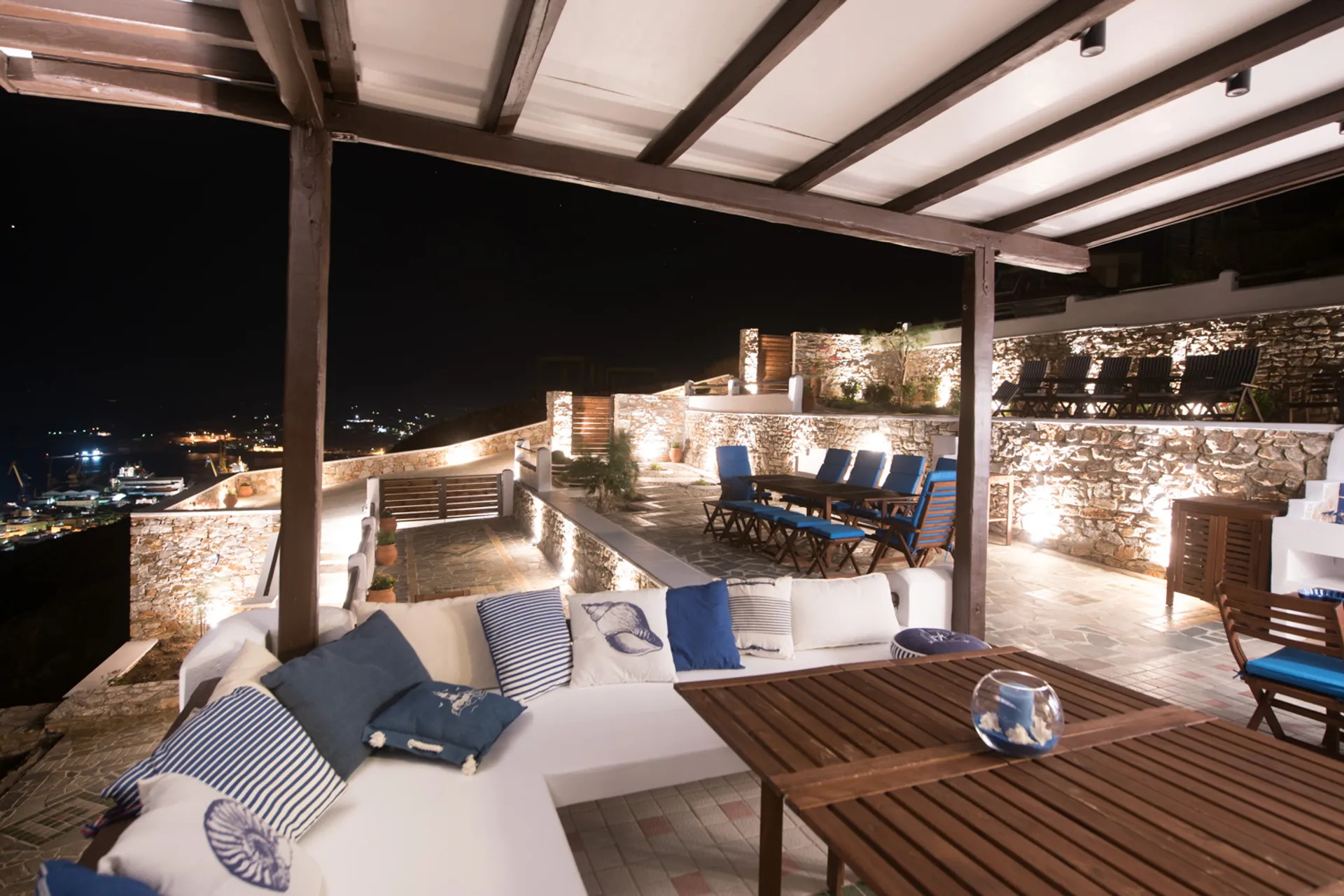 Night view of the villa's stone terrace...